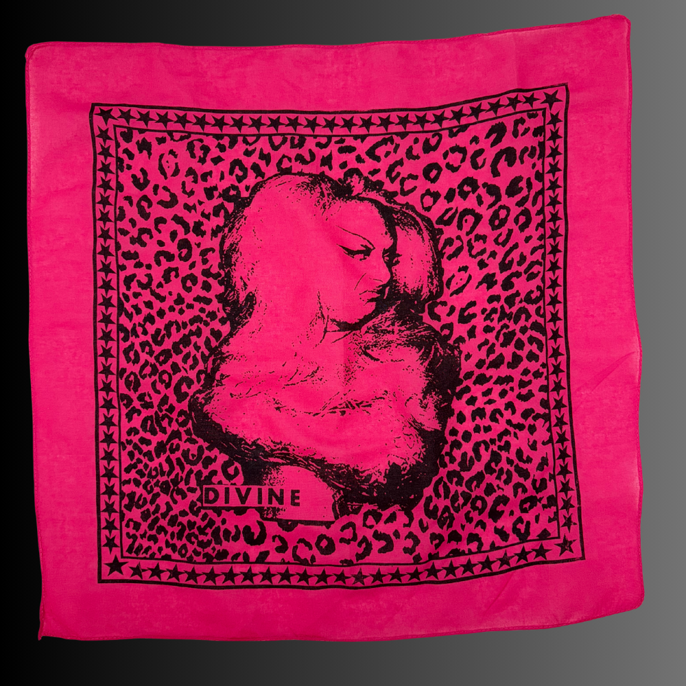 Hand-silk-screened cotton bandana featuring a portrait illustration of drag icon Divine printed in black ink on dark pink fabric.