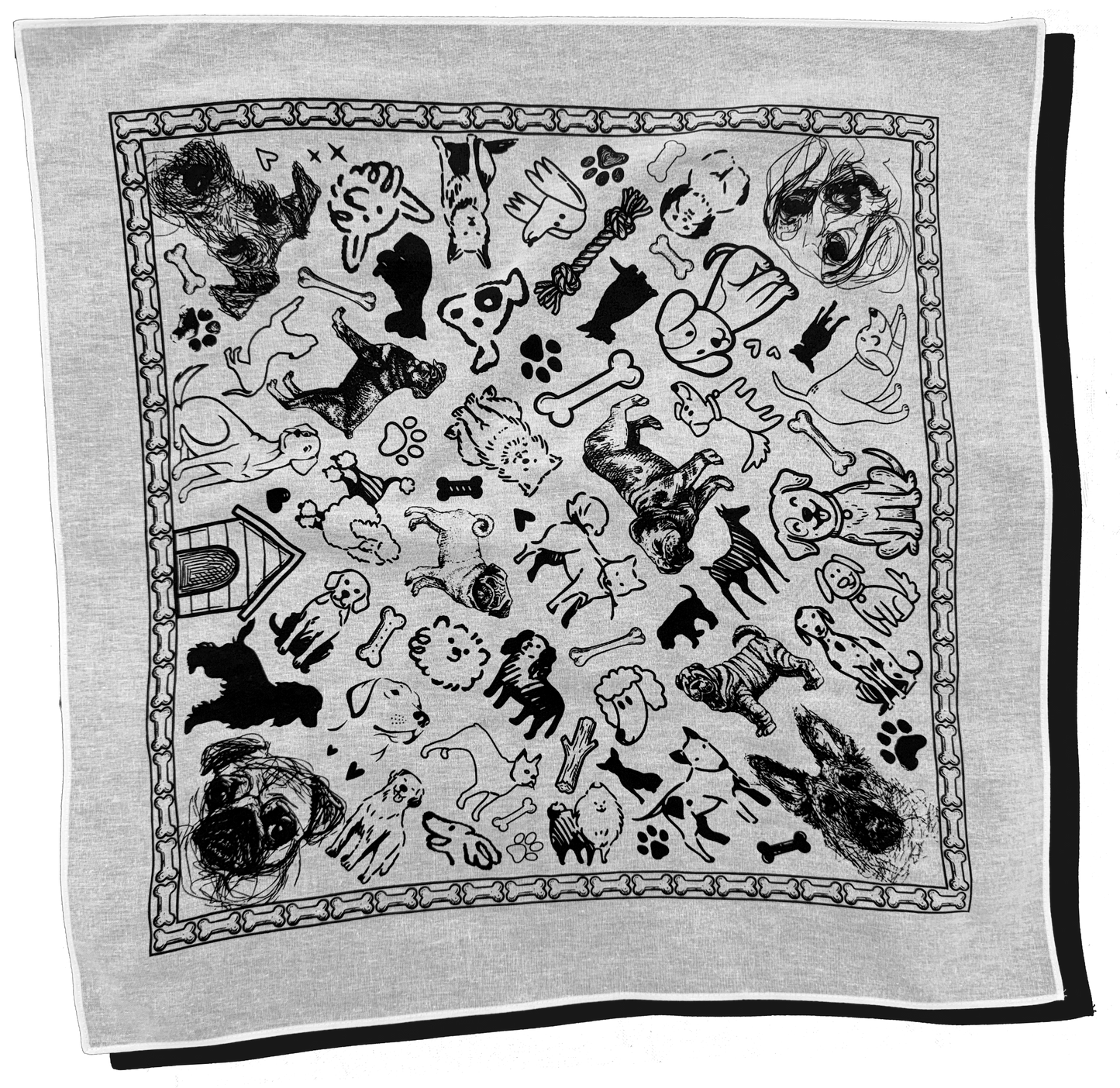 Black and white patterned towel with dog-themed illustrations on a white background