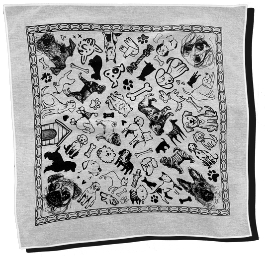 Black and white patterned towel with dog-themed illustrations on a white background
